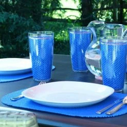 Fishnet 17 in. x 12 in. Process Blue PVC Covered Jute Oval Placemat (Set of 6) by Kraftware 9 Fishnet 17 in. x 12 in. Process Blue PVC Covered Jute Oval Placemat (Set of 6) by Kraftware -Table Linens Shop blues kraftware placemats 12246 31 1000