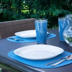 Fishnet 17 in. x 12 in. Niagara Blue PVC Covered Jute Oval Placemat (Set of 6) by Kraftware -Table Linens Shop blues kraftware placemats 39546 4f 1000