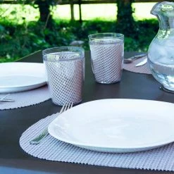 Fishnet 17 in. x 12 in. Tan PVC Covered Jute Oval Placemat (Set of 6) by Kraftware 8 Fishnet 17 in. x 12 in. Tan PVC Covered Jute Oval Placemat (Set of 6) by Kraftware -Table Linens Shop browns tans kraftware placemats 34146 4f 1000