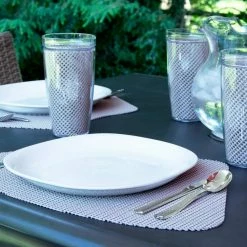 Fishnet 19 in. x 13 in. Tan PVC Covered Jute Wedge Placemat (Set of 6) by Kraftware -Table Linens Shop browns tans kraftware placemats 34149 31 1000