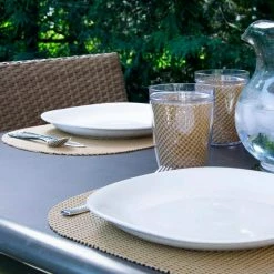 Fishnet 17 in. x 12 in. Camel PVC Covered Jute Oval Placemat (Set of 6) by Kraftware -Table Linens Shop browns tans kraftware placemats 38646 4f 1000