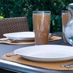 Fishnet 17 in. x 12 in. Toffee PVC Covered Jute Oval Placemat (Set of 6) by Kraftware -Table Linens Shop browns tans kraftware placemats 38746 4f 1000