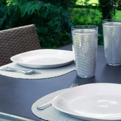 Fishnet 17 in. x 12 in. Light Gray PVC Covered Jute Oval Placemat (Set of 6) by Kraftware -Table Linens Shop grays kraftware placemats 40246 4f 1000