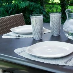 Fishnet 19 in. x 13 in. Light Gray PVC Covered Jute Wedge Placemat (Set of 6) by Kraftware -Table Linens Shop grays kraftware placemats 40249 31 1000