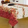 52 in. W x 70 in. L Multi Color Swaying Leaves Bordered Fall Tablecloth by Elrene