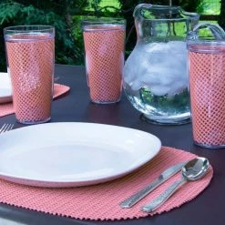 Fishnet 17 in. x 12 in. Burnt Coral PVC Covered Jute Oval Placemat (Set of 6) by Kraftware -Table Linens Shop oranges peaches kraftware placemats 40146 31 1000