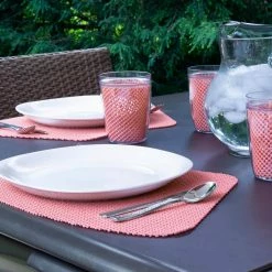 Fishnet 19 in. x 13 in. Burnt Coral PVC Covered Jute Wedge Placemat (Set of 6) by Kraftware 9 Fishnet 19 in. x 13 in. Burnt Coral PVC Covered Jute Wedge Placemat (Set of 6) by Kraftware -Table Linens Shop oranges peaches kraftware placemats 40149 31 1000