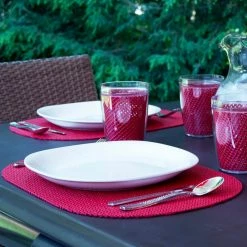 Fishnet 17 in. x 12 in. Flag Red PVC Covered Jute Oval Placemat (Set of 6) by Kraftware 9 Fishnet 17 in. x 12 in. Flag Red PVC Covered Jute Oval Placemat (Set of 6) by Kraftware -Table Linens Shop reds pinks kraftware placemats 33046 31 1000