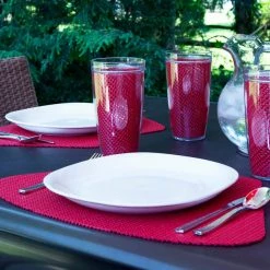 Fishnet 19 in. x 13 in. Flag Red PVC Covered Jute Wedge Placemat (Set of 6) by Kraftware 9 Fishnet 19 in. x 13 in. Flag Red PVC Covered Jute Wedge Placemat (Set of 6) by Kraftware -Table Linens Shop reds pinks kraftware placemats 33049 31 1000