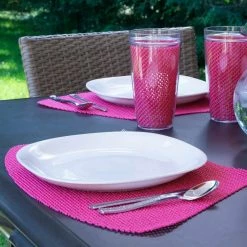 Fishnet 19 in. x 13 in. Pink Yarrow PVC Covered Jute Wedge Placemat (Set of 6) by Kraftware -Table Linens Shop reds pinks kraftware placemats 39449 31 1000