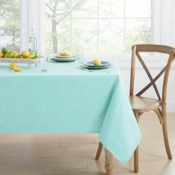 Margarita 60 in. W x 102 in. L Turquoise Textured Cotton Tablecloth by Fiesta -Table Linens Shop turquoises aquas fiesta tablecloths tc013871tnfib2 442 40 1000