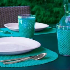 Fishnet 17 in. x 12 in. Teal PVC Covered Jute Oval Placemat (Set of 6) by Kraftware -Table Linens Shop turquoises aquas kraftware placemats 32046 4f 1000