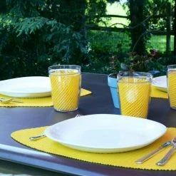 Fishnet 19 in. x 13 in. Yellow PVC Covered Jute Wedge Placemat (Set of 6) by Kraftware -Table Linens Shop yellows golds kraftware placemats 11649 31 1000
