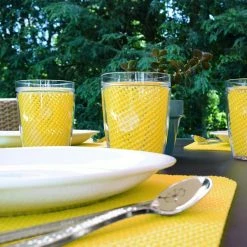 Fishnet 19 in. x 13 in. Yellow PVC Covered Jute Wedge Placemat (Set of 6) by Kraftware -Table Linens Shop yellows golds kraftware placemats 11649 4f 1000