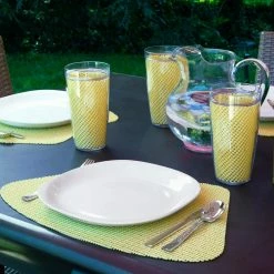 Fishnet 19 in. x 13 in. Lemon PVC Covered Jute Wedge Placemat (Set of 6) by Kraftware 9 Fishnet 19 in. x 13 in. Lemon PVC Covered Jute Wedge Placemat (Set of 6) by Kraftware -Table Linens Shop yellows golds kraftware placemats 13949 31 1000
