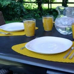 Fishnet 19 in. x 13 in. Golden PVC Covered Jute Wedge Placemat (Set of 6) by Kraftware -Table Linens Shop yellows golds kraftware placemats 35349 31 1000