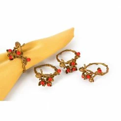 Gold Holly Berry Holiday Painted Brass Metal with Resin Berry Napkin Rings (Set of 4) by Manor Luxe
