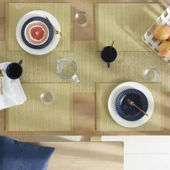 Coiled Woven PVC 12 in. W x 17 in. H Gold Polyester Placemat (Set of 4) by TOWN & COUNTRY LIVING -Table Linens Shop yellows golds placemats p4013282tdec 710 40 1000